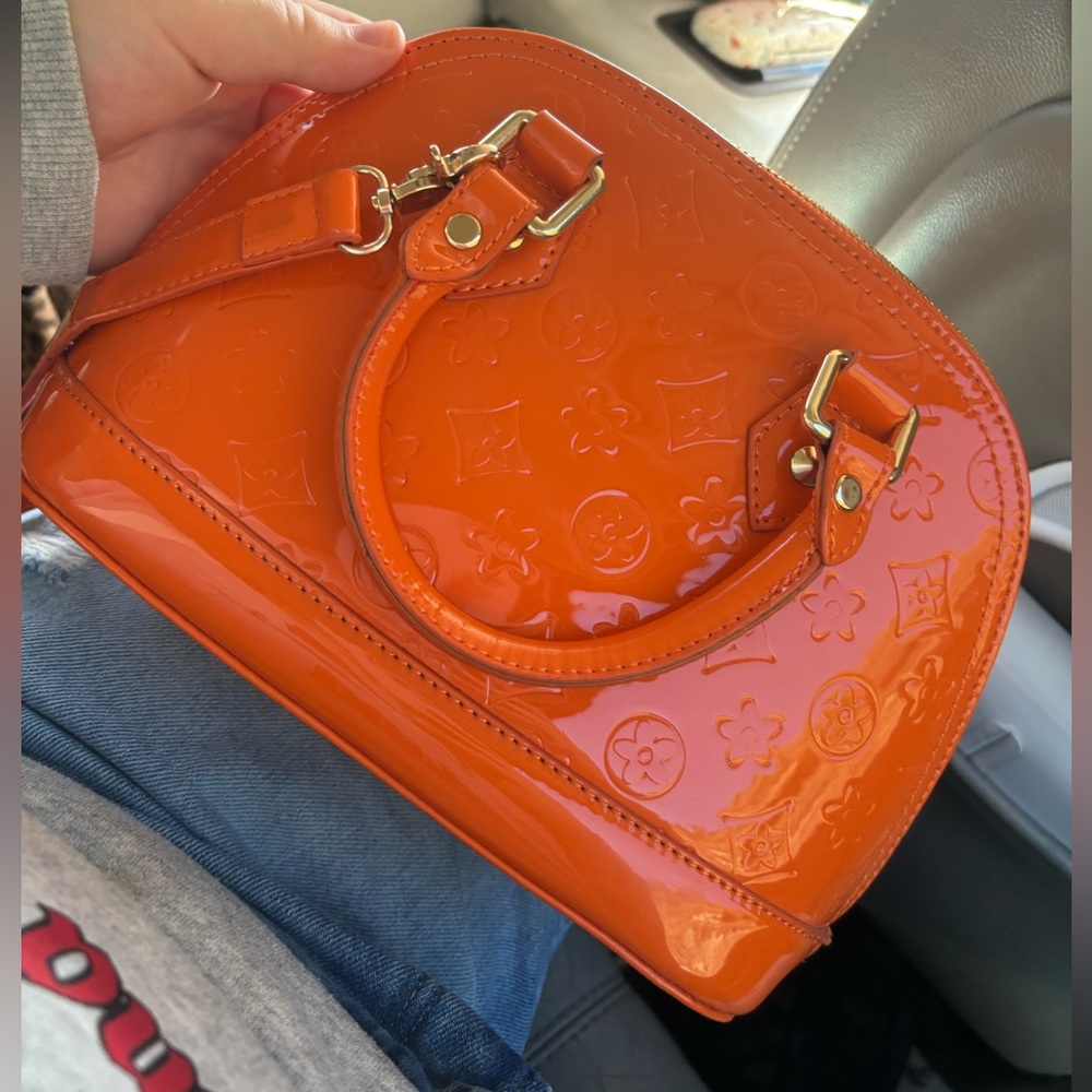 Orange hand bag
